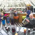 Grandad reads the paper, Harry's Pirate Party, The Oaksmere, Brome, Suffolk - 16th April 2016