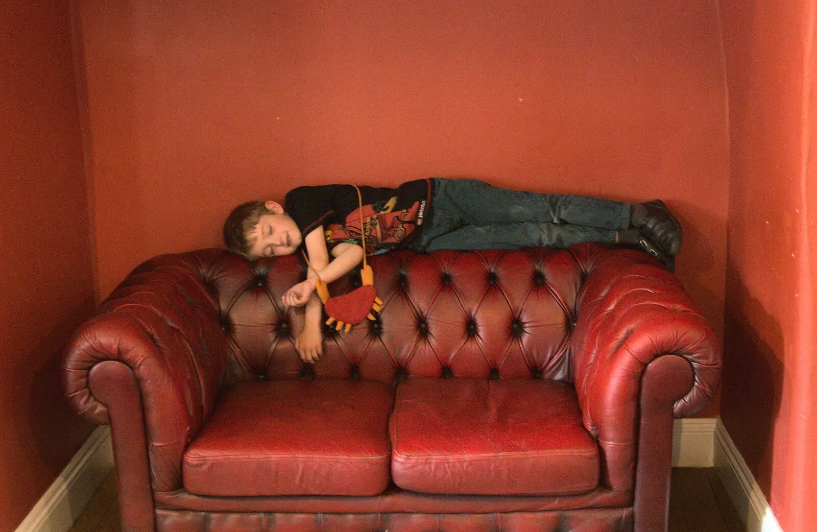 Fred pretends to sleep on a red-leather sofa, from The BSCC Cycling Weekender, Outwell, West Norfolk - 7th May 2016