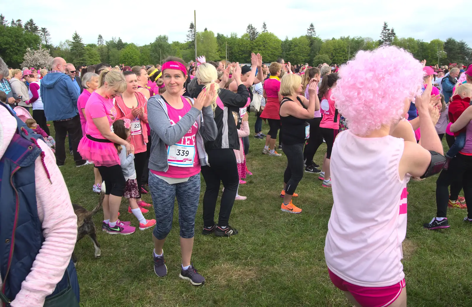 Isobel does some sort of warm up, from Isobel's Race for Life, Costessey, Norwich - 15th May 2016