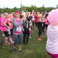 Isobel does some sort of warm up, Isobel's Race for Life, Costessey, Norwich - 15th May 2016