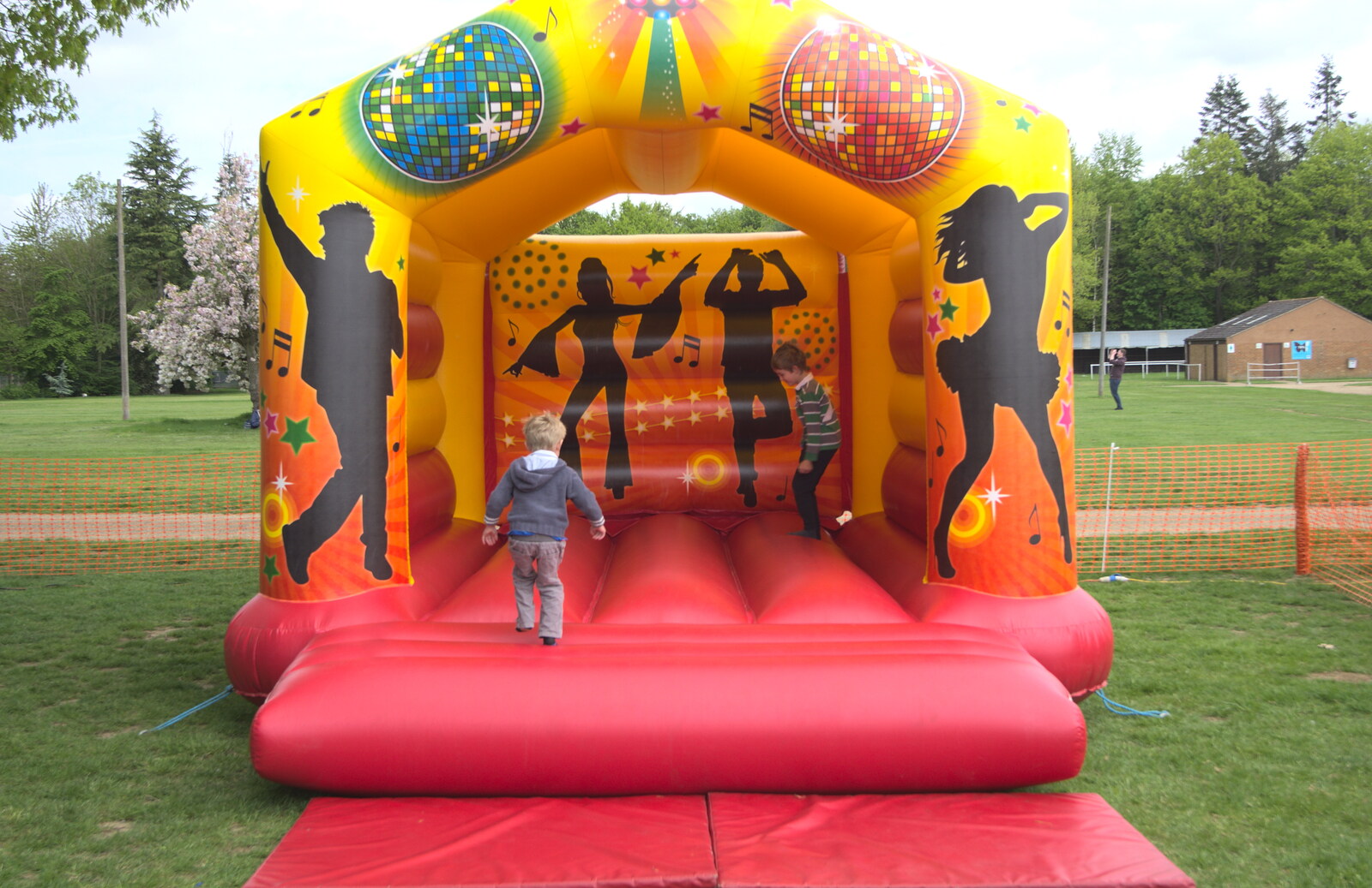 The boys find a bouncy castle from Isobel's Race for Life, Costessey, Norwich - 15th May 2016
