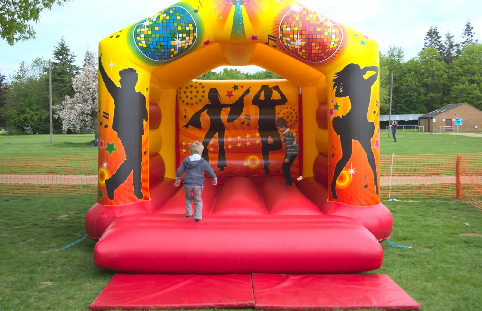 The boys find a bouncy castle, from Isobel's Race for Life, Costessey, Norwich - 15th May 2016