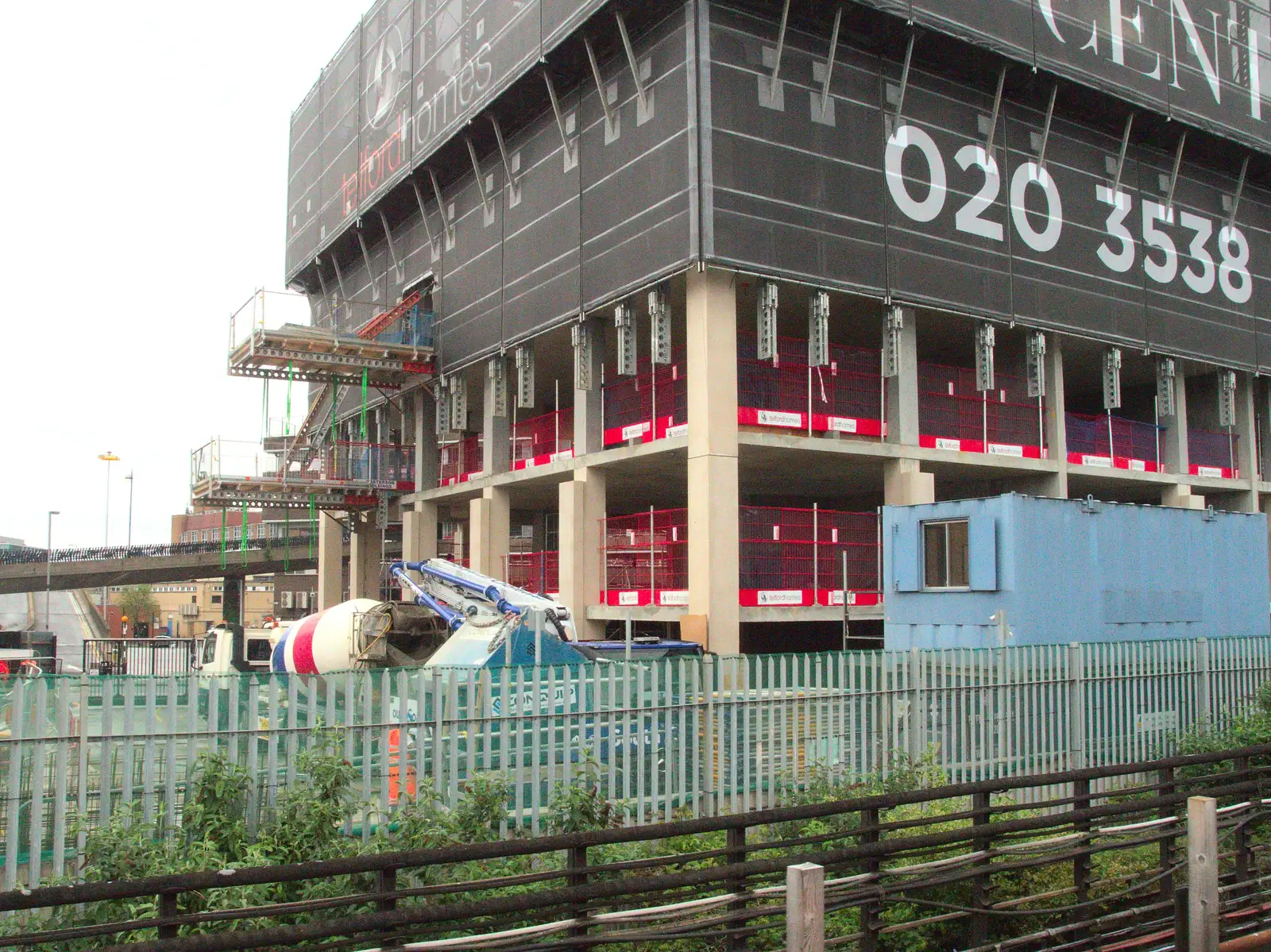 A new tower block goes up near Stratford, from The BSCC at the Wortwell Bell, Wortwell, Norfolk - 26th May 2016