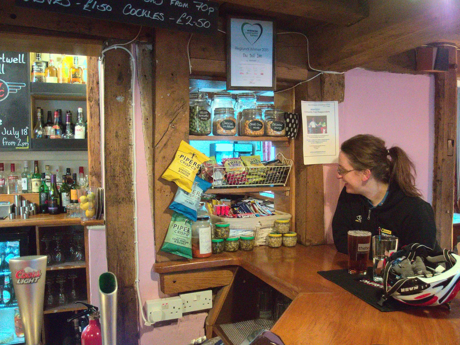 Suey looks at the snack collection, from The BSCC at the Wortwell Bell, Wortwell, Norfolk - 26th May 2016