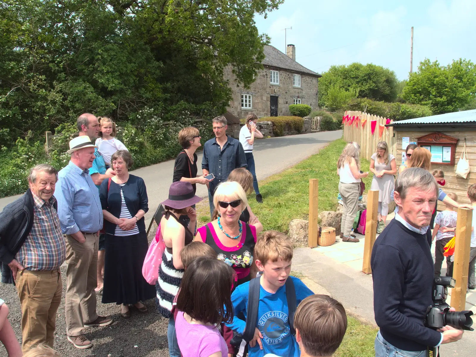 The crowds assembled outside the pool, from The Grand Re-opening of the Chagford Lido, Chagford, Devon - 28th May 2016