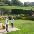 Fred and Harry peer around with binoculars, A Visit to Okehampton Castle and Dartmoor, Devon  - 28th May 2016