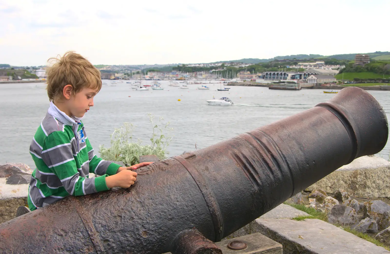 Fred pokes at a cannon, from A Tamar River Trip, Plymouth, Devon - 30th May 2016