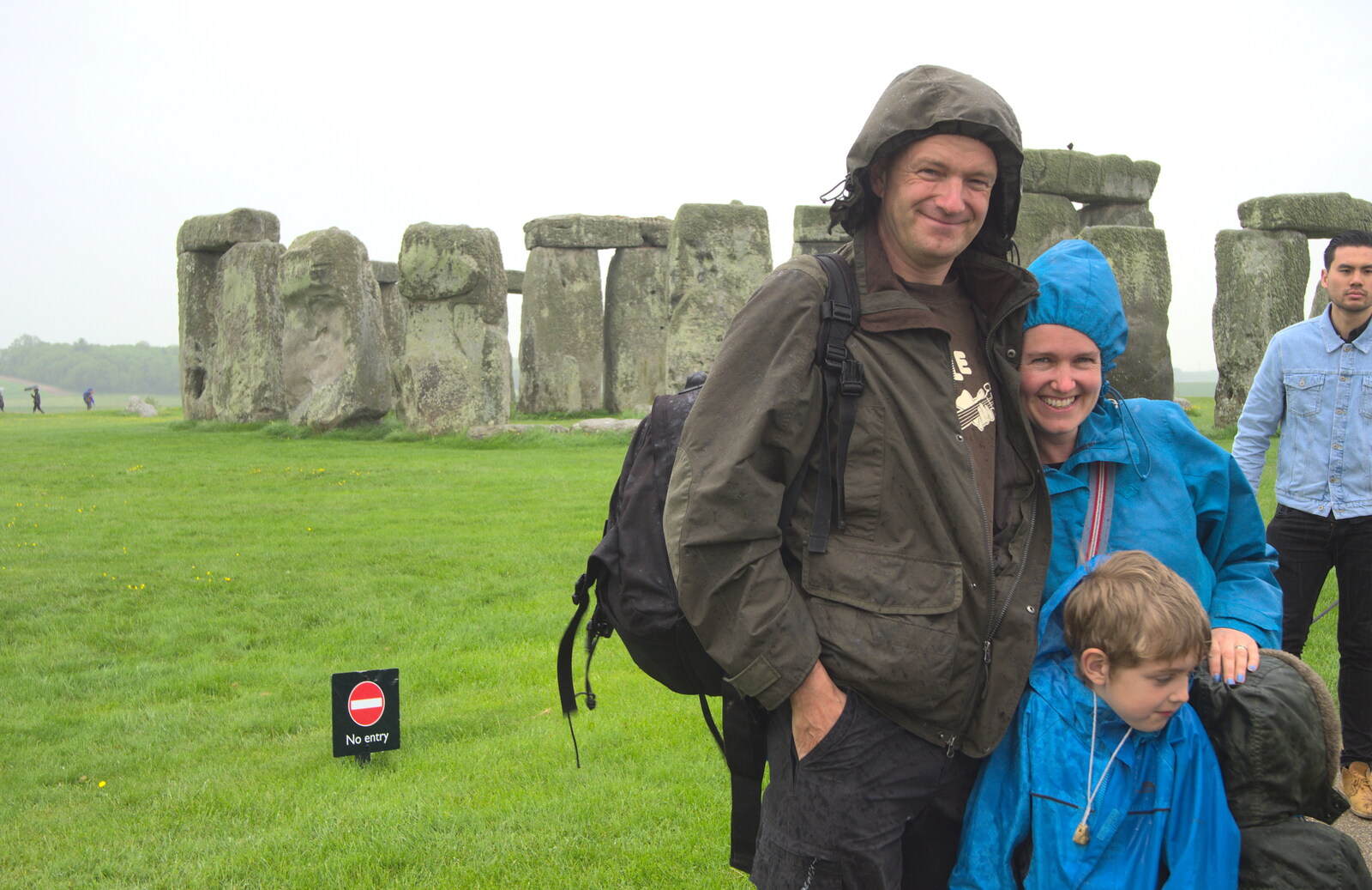A wet family photo, courtesy of another visitor from Spreyton to Stonehenge, Salisbury Plain, Wiltshire - 31st May 2016