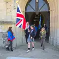 The flag bearer comes out of the church, A Trip to the Office and the Mayor-Making Parade, Eye, Suffolk - 4th June 2016