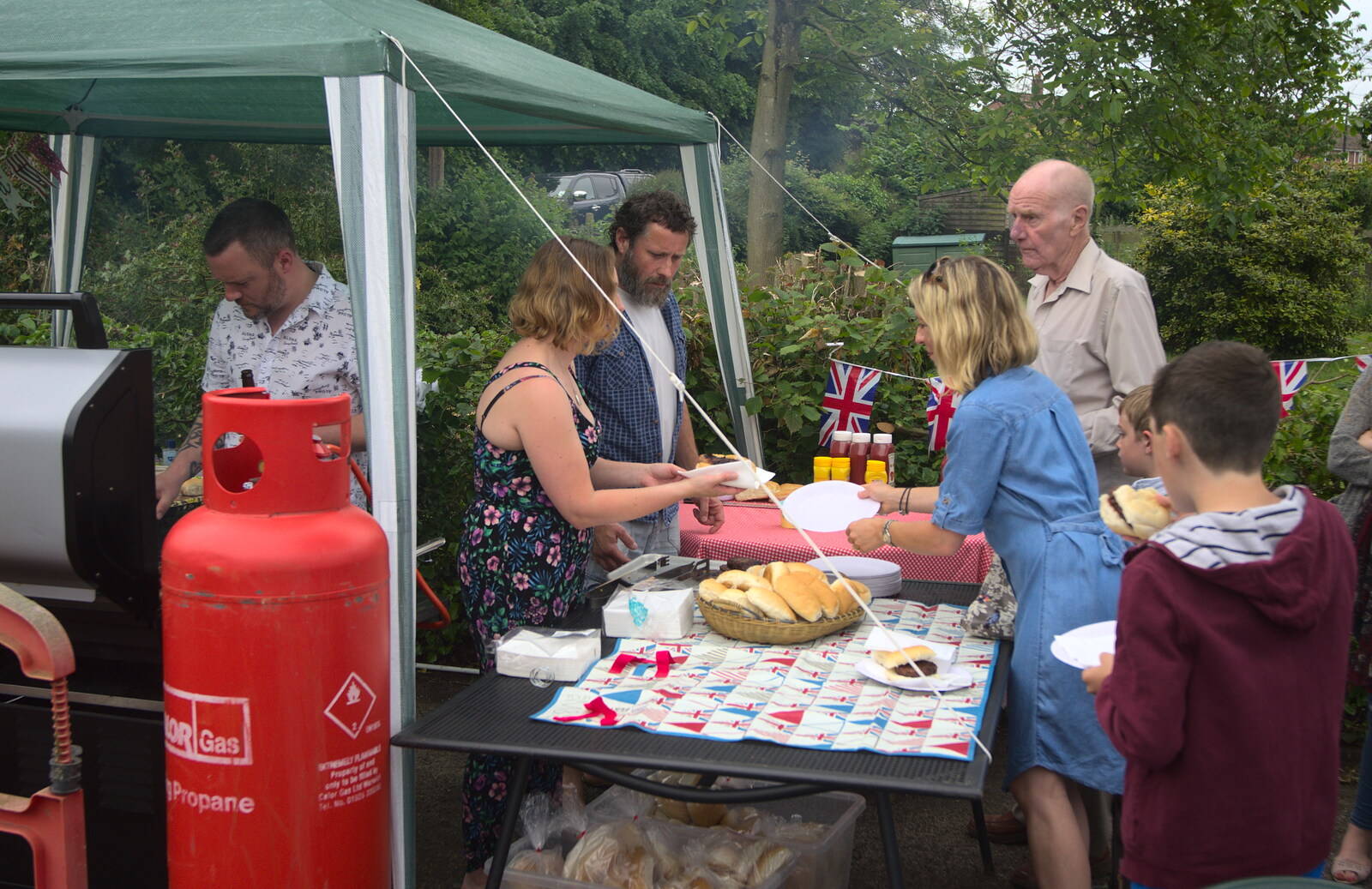 Grandad's queuing at the barbeque from The Queen's Village Hall Birthday, Brome, Suffolk - 12th June 2016