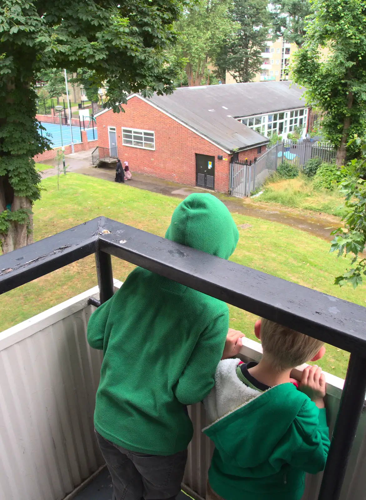 Fred and Harry peer over the balcony, from Caoimhe the Shoe's Desk, Highbury, London - 18th June 2016