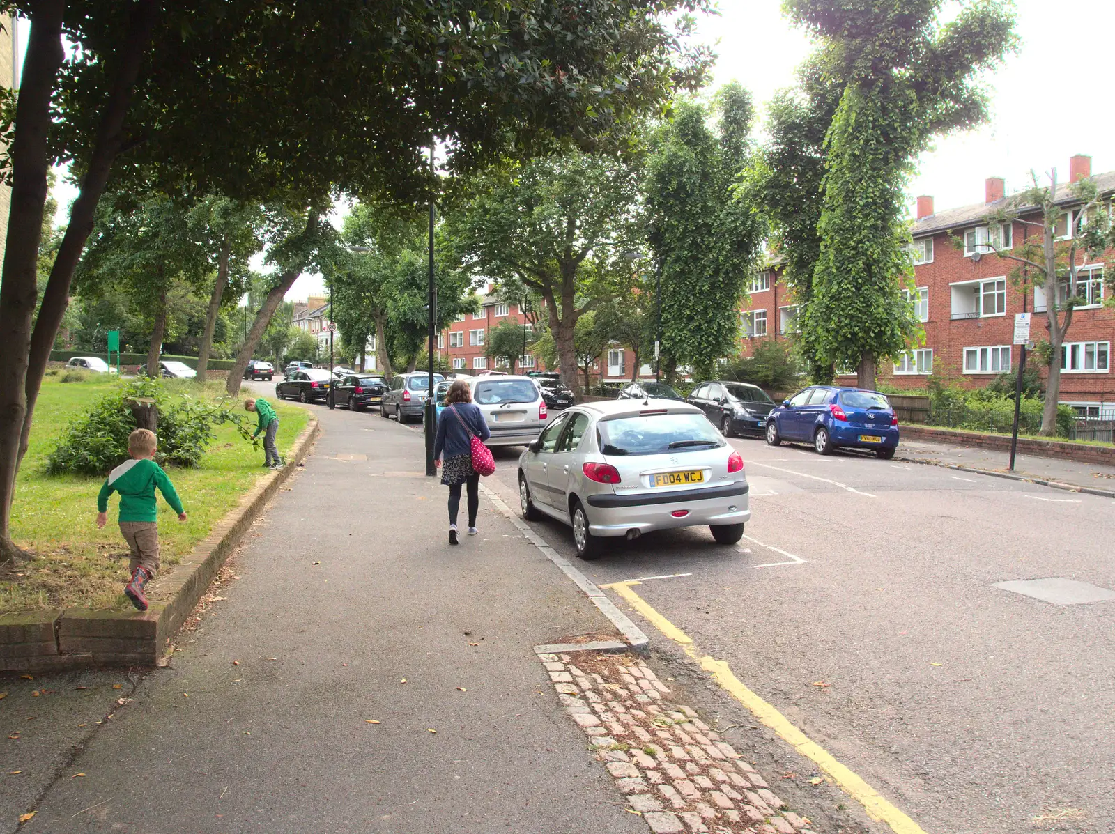 Isobel walks up the street, from Caoimhe the Shoe's Desk, Highbury, London - 18th June 2016