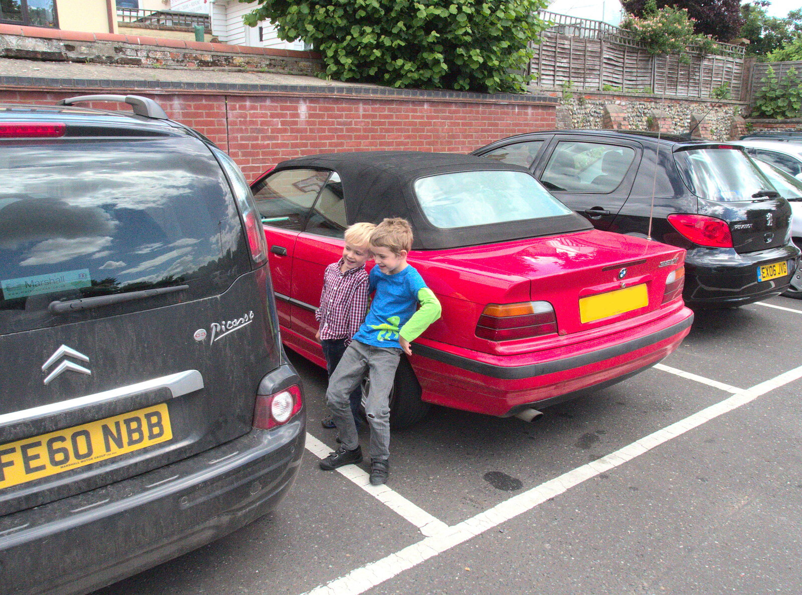 The boys lean on the car from A Trip to Norwich and Diss Markets, Norfolk - 25th June 2016