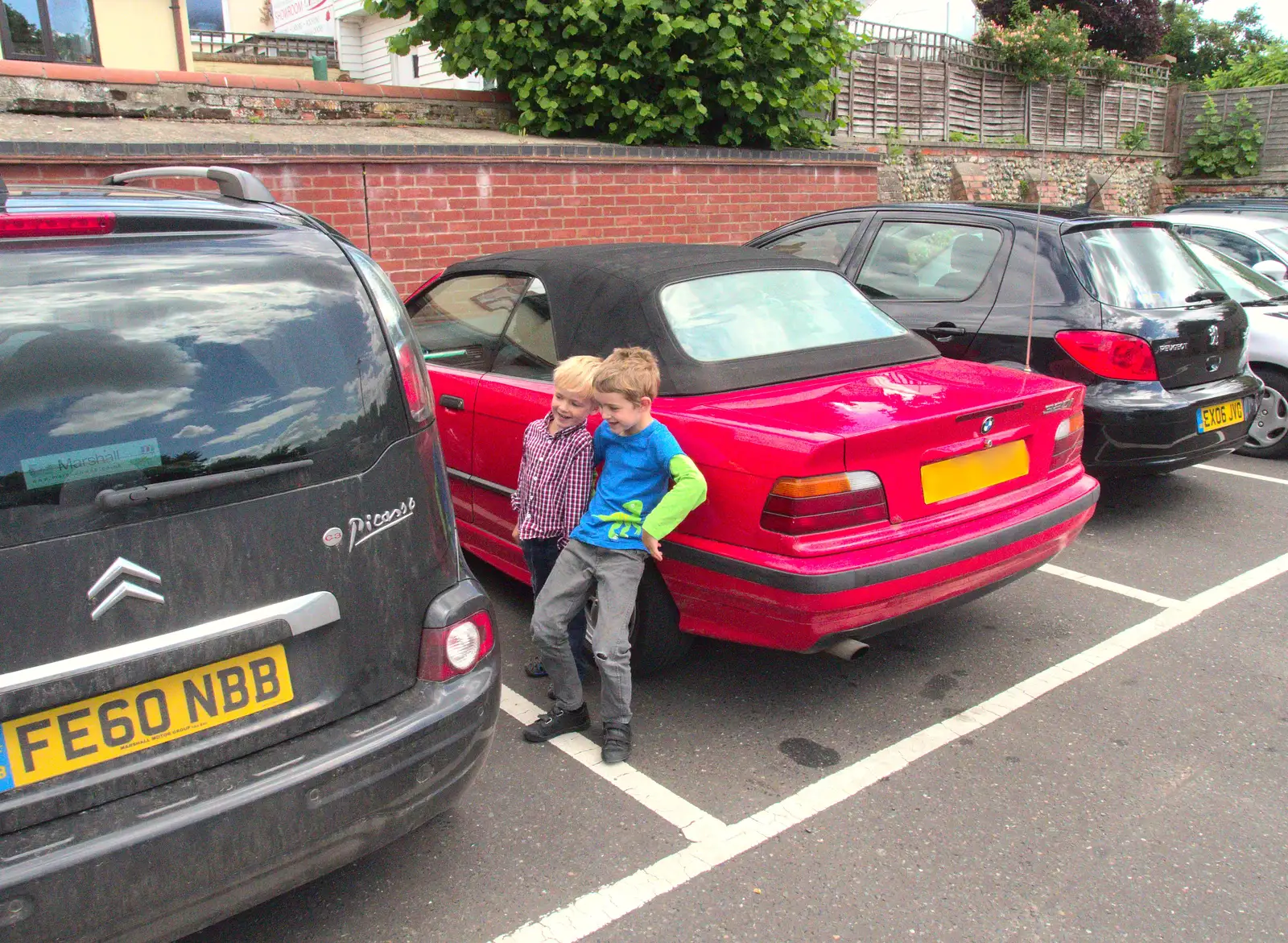 The boys lean on the car, from A Trip to Norwich and Diss Markets, Norfolk - 25th June 2016