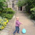 Harry and his balloon outside the church, A Trip to Norwich and Diss Markets, Norfolk - 25th June 2016