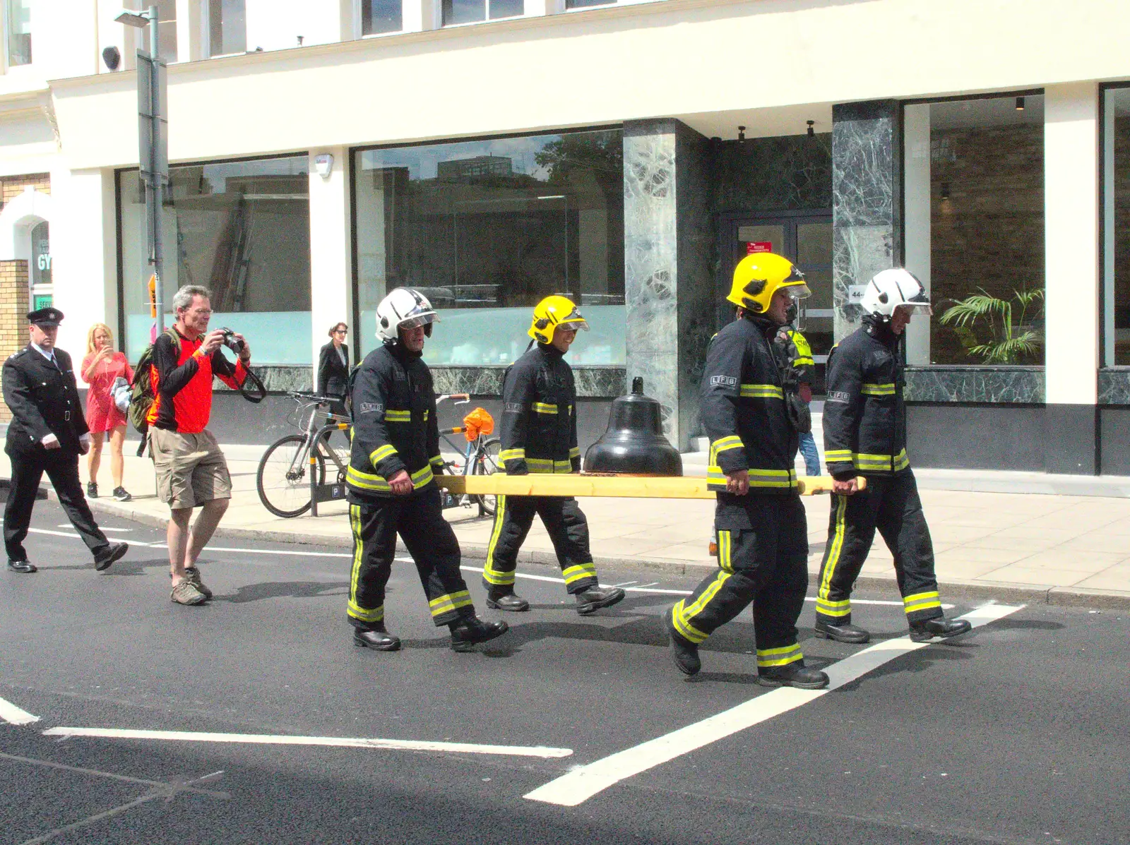 The bell is carried up Southwark Street, from Harry's Sports Day and a London March, Southwark and Eye, Suffolk - 7th July 2016