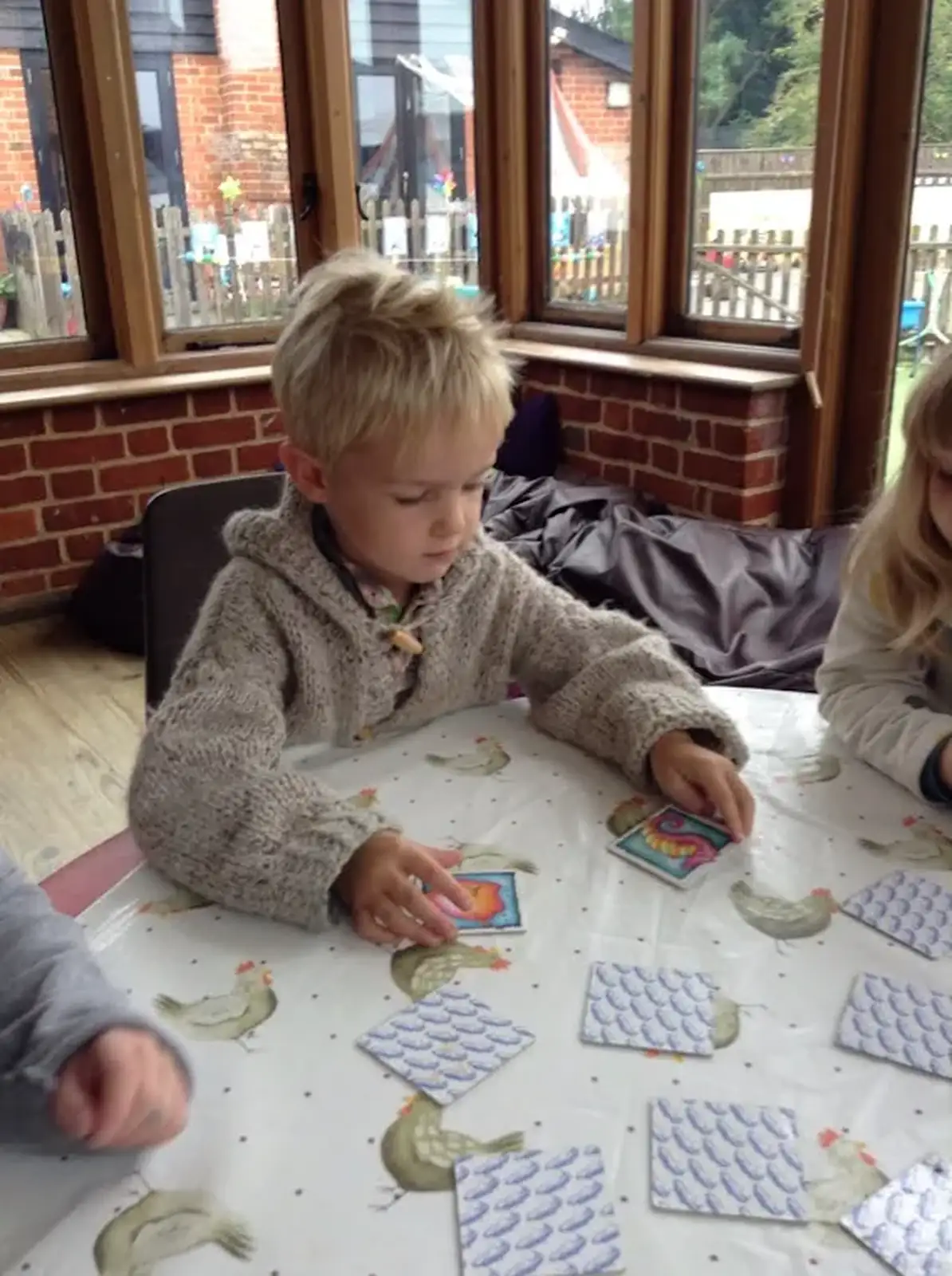 Harry does something with cards, from Harry's Nursery Life, Mulberry Bush, Eye, Suffolk - 8th July 2016