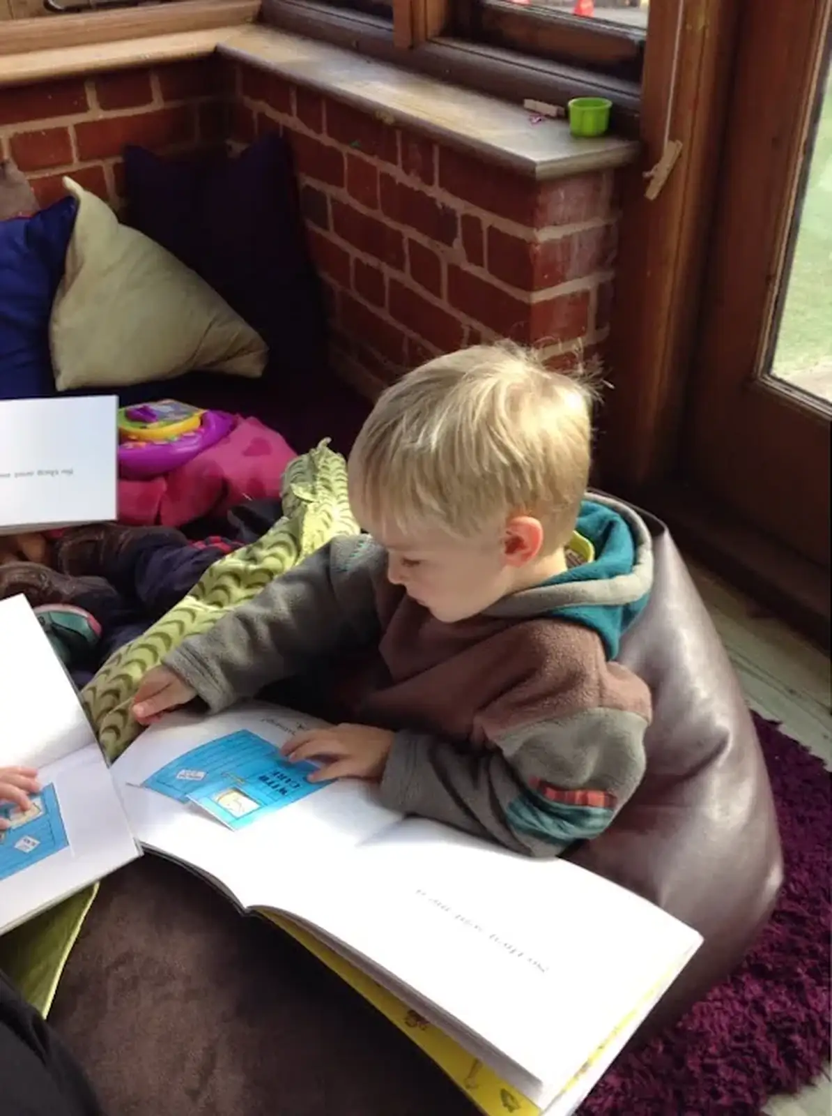 Harry does some reading, from Harry's Nursery Life, Mulberry Bush, Eye, Suffolk - 8th July 2016