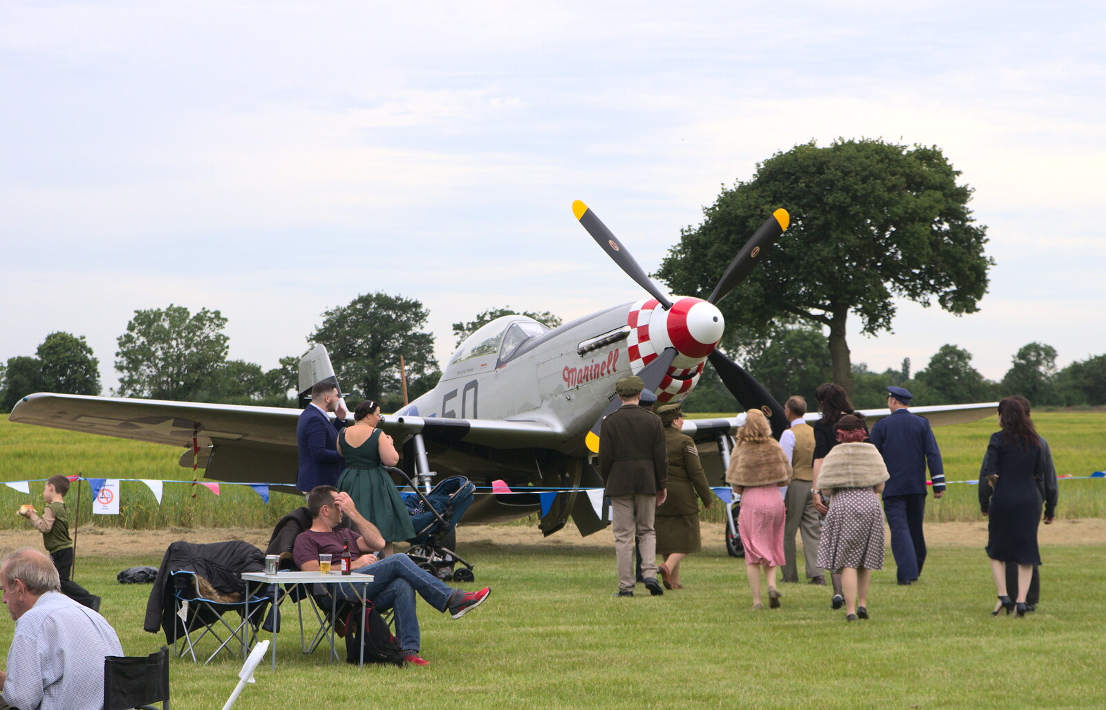 A group wanders off to see Janie from "Our Little Friends" Warbirds Hangar Dance, Hardwick, Norfolk - 9th July 2016