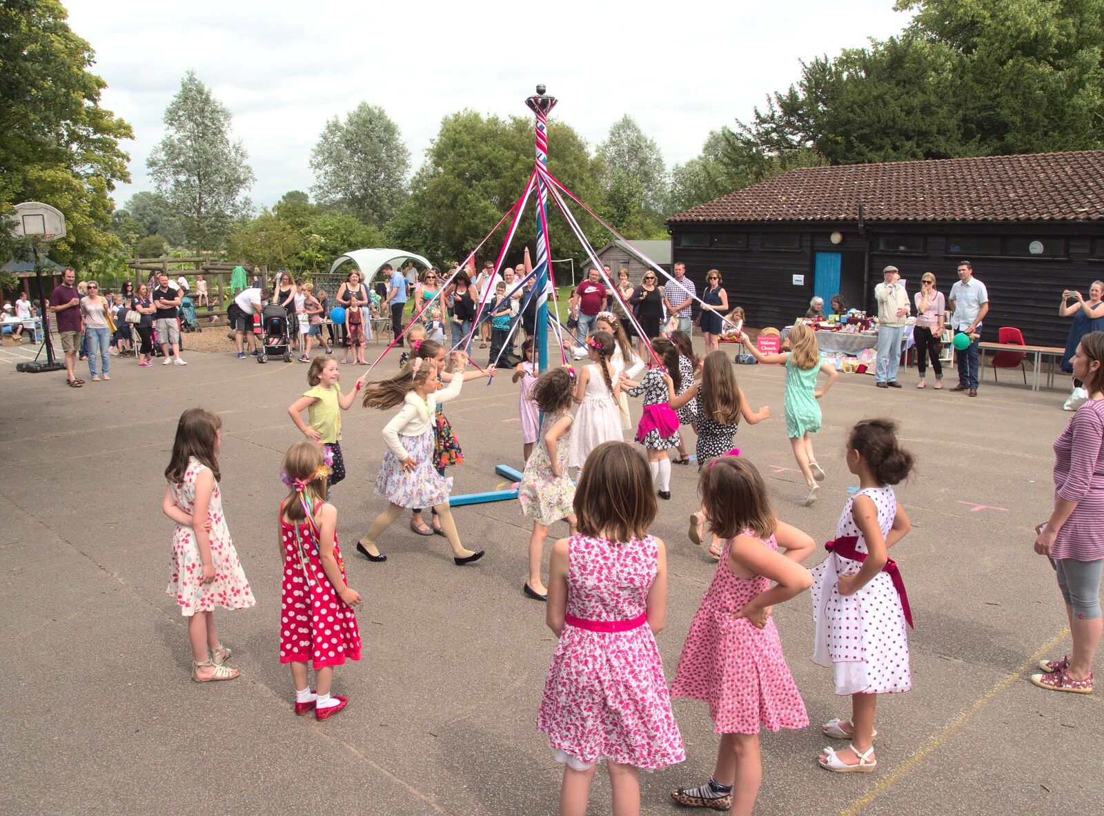 Maypole dancing occurs on the playground from Eye Primary Summer Fayre, Eye, Suffolk - 9th July 2016