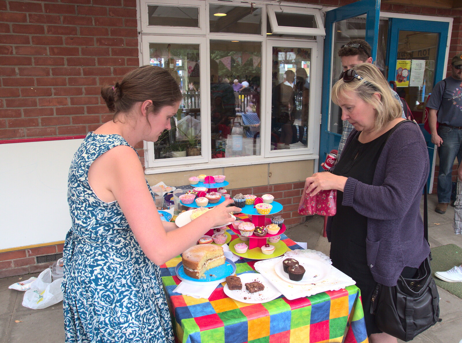 Isobel does the cake stall from Eye Primary Summer Fayre, Eye, Suffolk - 9th July 2016