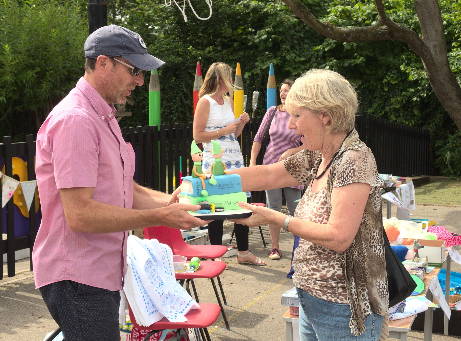 The cake prize is handed over from Eye Primary Summer Fayre, Eye, Suffolk - 9th July 2016