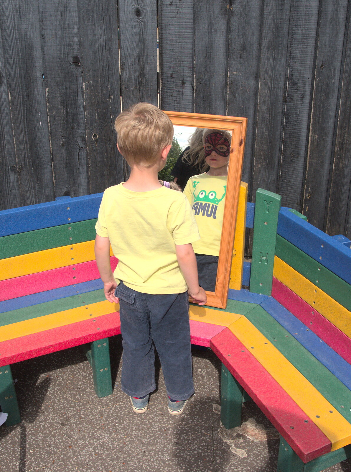 Harry checks himself out in the mirror from Eye Primary Summer Fayre, Eye, Suffolk - 9th July 2016