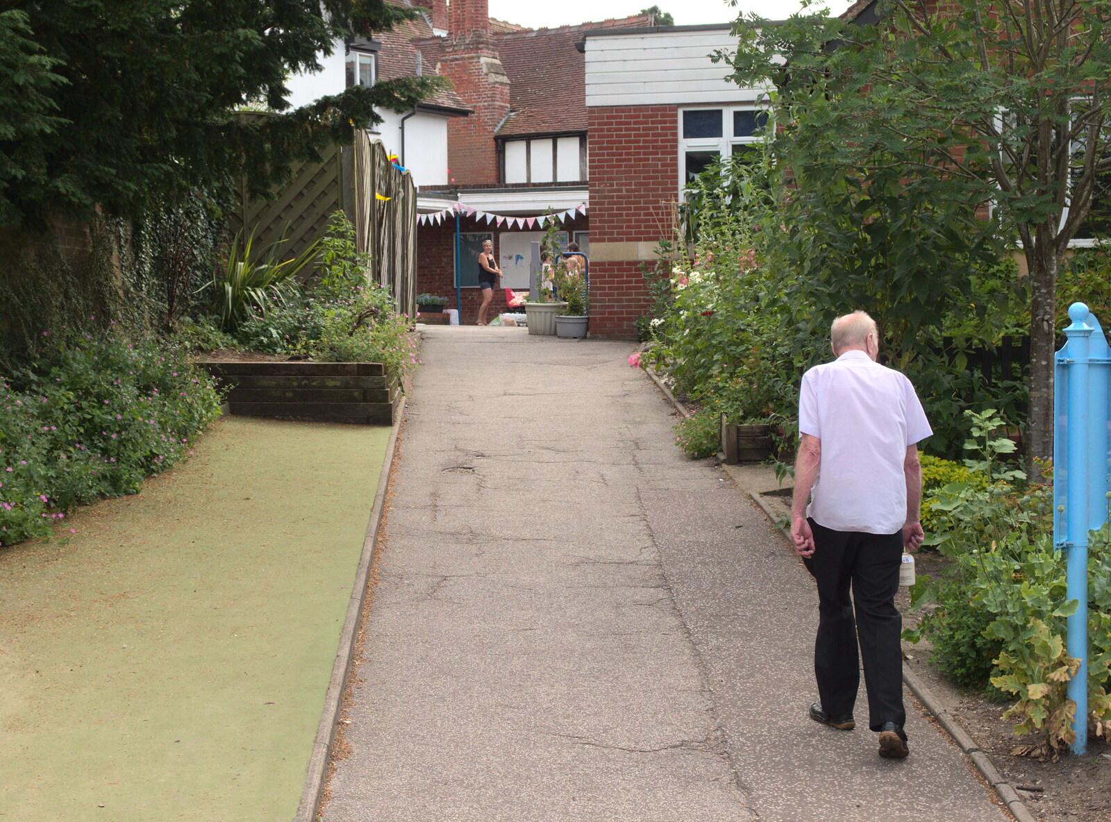 Grandad wanders off up to the exit from Eye Primary Summer Fayre, Eye, Suffolk - 9th July 2016