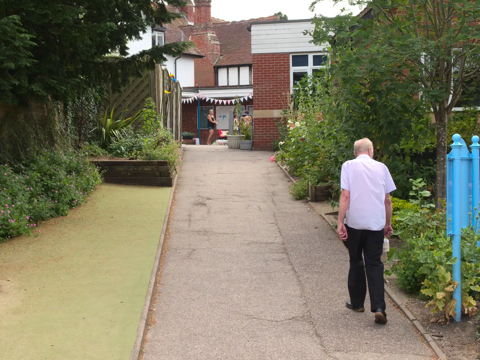 Grandad wanders off up to the exit, from Eye Primary Summer Fayre, Eye, Suffolk - 9th July 2016