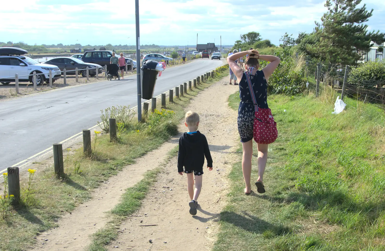 Harry and Isobel walk along the harbour road, from A Short Trip to Southwold, Suffolk - 24th July 2016