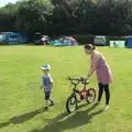 Isobel gets Harry's bike ready, Camping in West Runton, North Norfolk - 30th July 2016