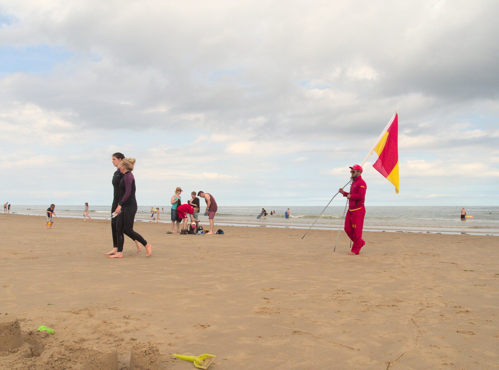 Camping in West Runton, North Norfolk - 30th July 2016: The lifeguard flag is brought in