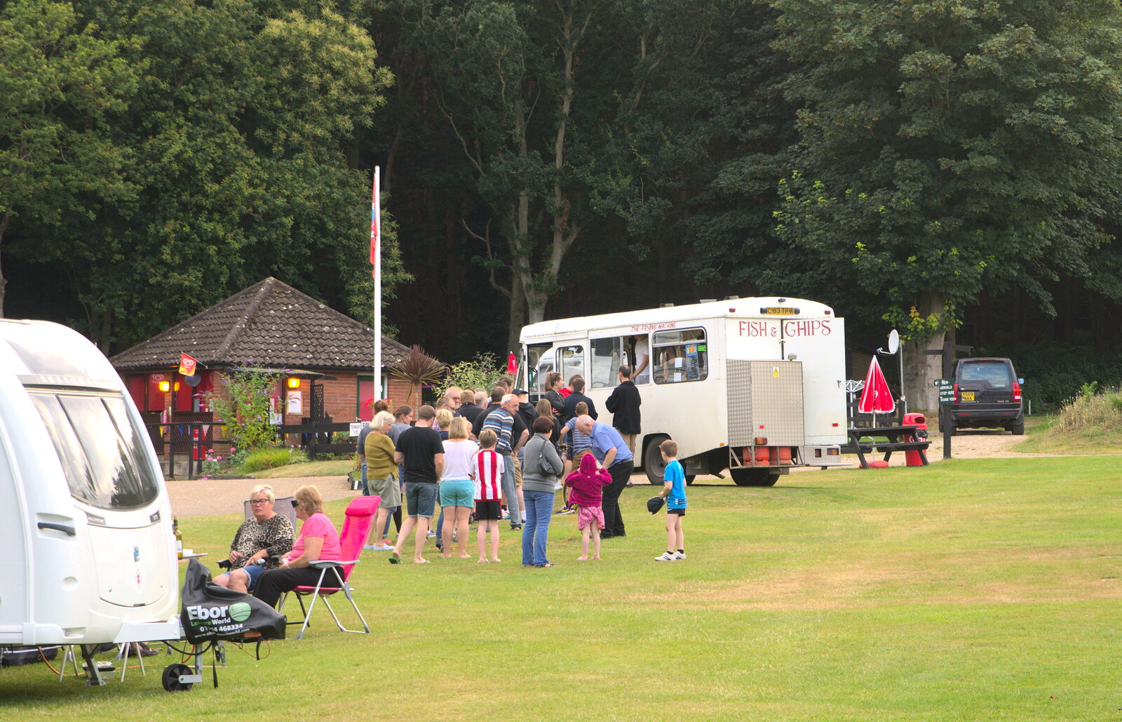 An epic queue for the chip van soon builds up from Camping in West Runton, North Norfolk - 30th July 2016