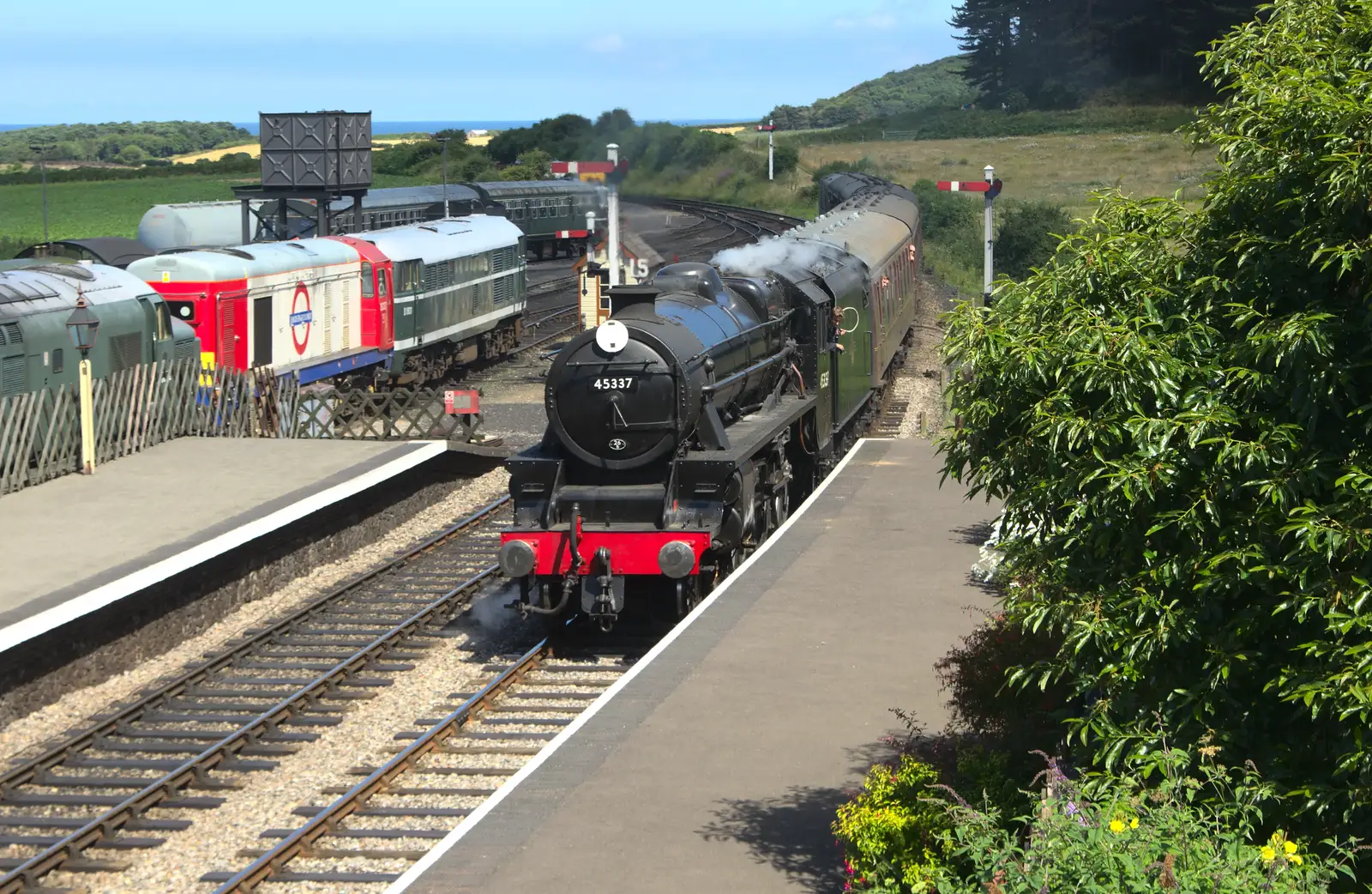 Black 5 loco 45337 comes into Weybourne, from Sheringham Steam, Sheringham, North Norfolk - 31st July 2016