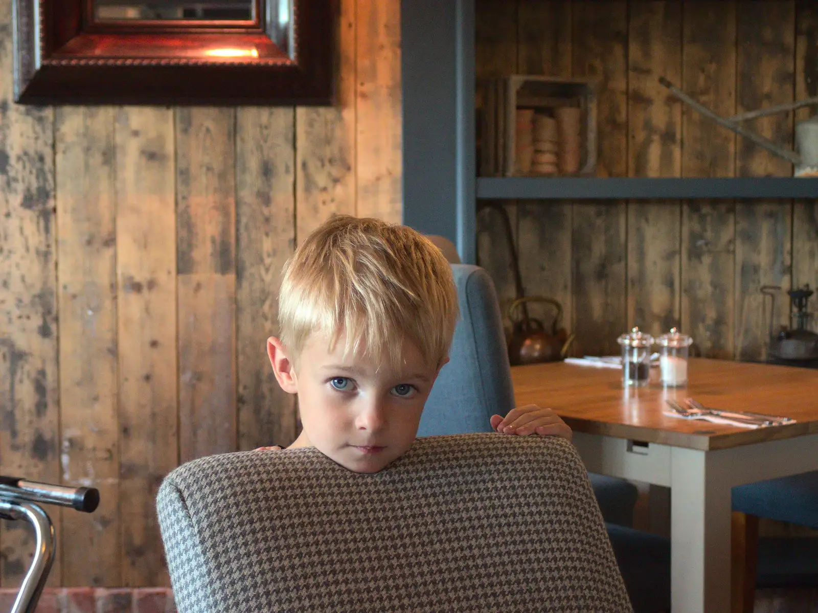 Harry hangs on a chair at the Premier Inn, from Camping With Sean, Ashburton, Devon - 8th August 2016