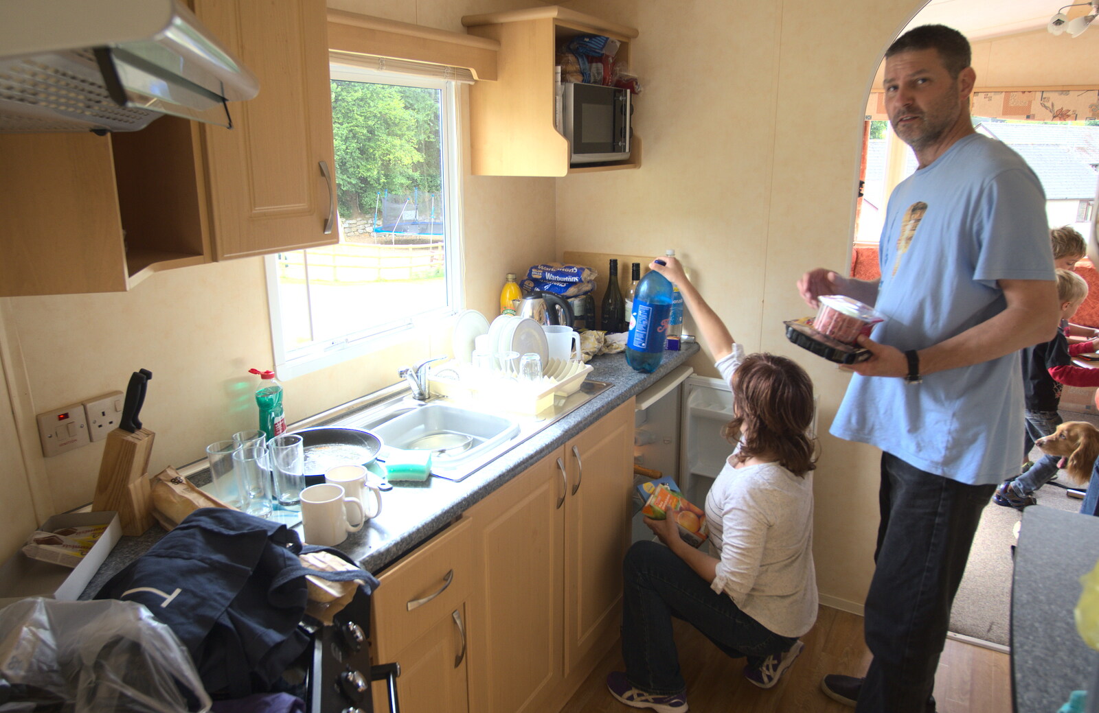 Michelle and Sean in the caravan kitchen from Camping With Sean, Ashburton, Devon - 8th August 2016