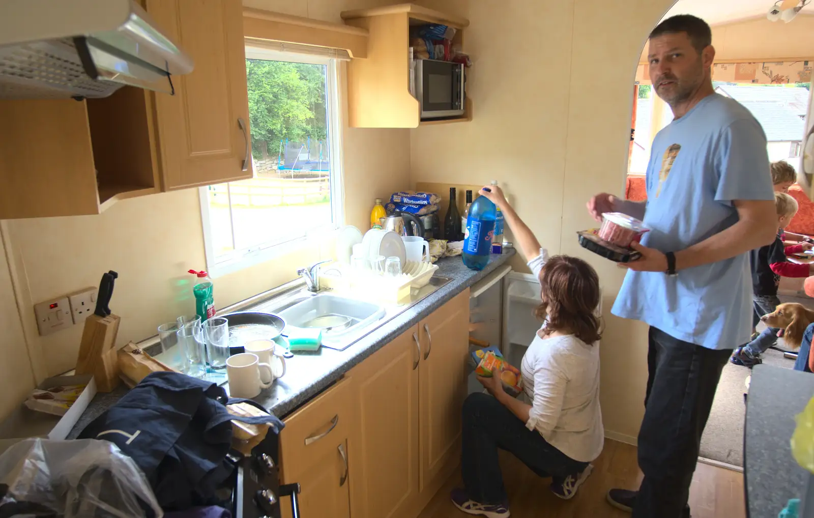 Michelle and Sean in the caravan kitchen, from Camping With Sean, Ashburton, Devon - 8th August 2016