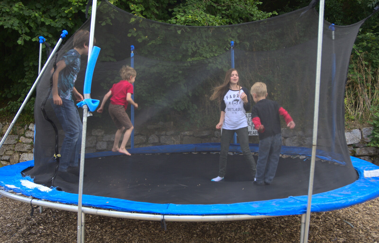 The gang bounce around on a trampoline from Camping With Sean, Ashburton, Devon - 8th August 2016