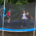 The children bounce around on a trampoline, Camping With Sean, Ashburton, Devon - 8th August 2016