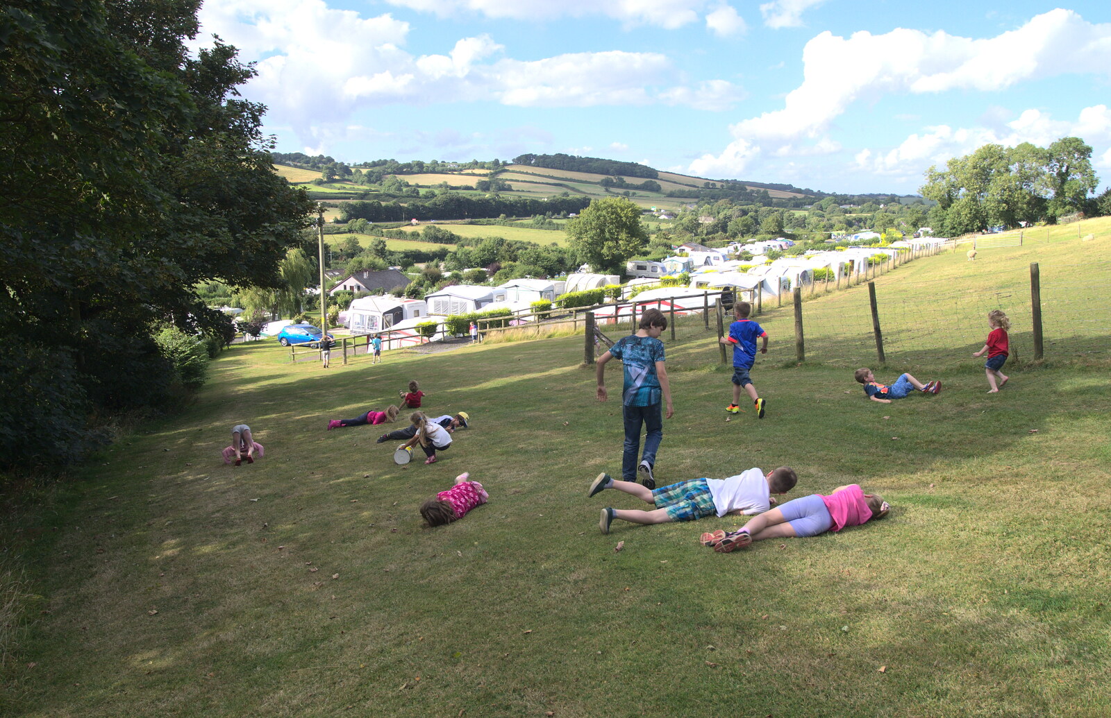 The children all roll down a hill from Camping With Sean, Ashburton, Devon - 8th August 2016