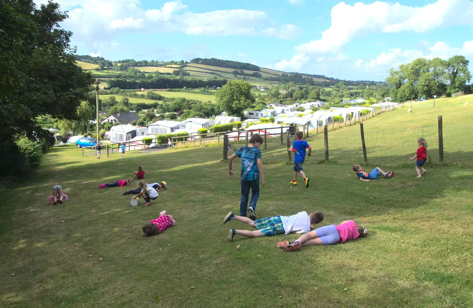 The children all roll down a hill, from Camping With Sean, Ashburton, Devon - 8th August 2016