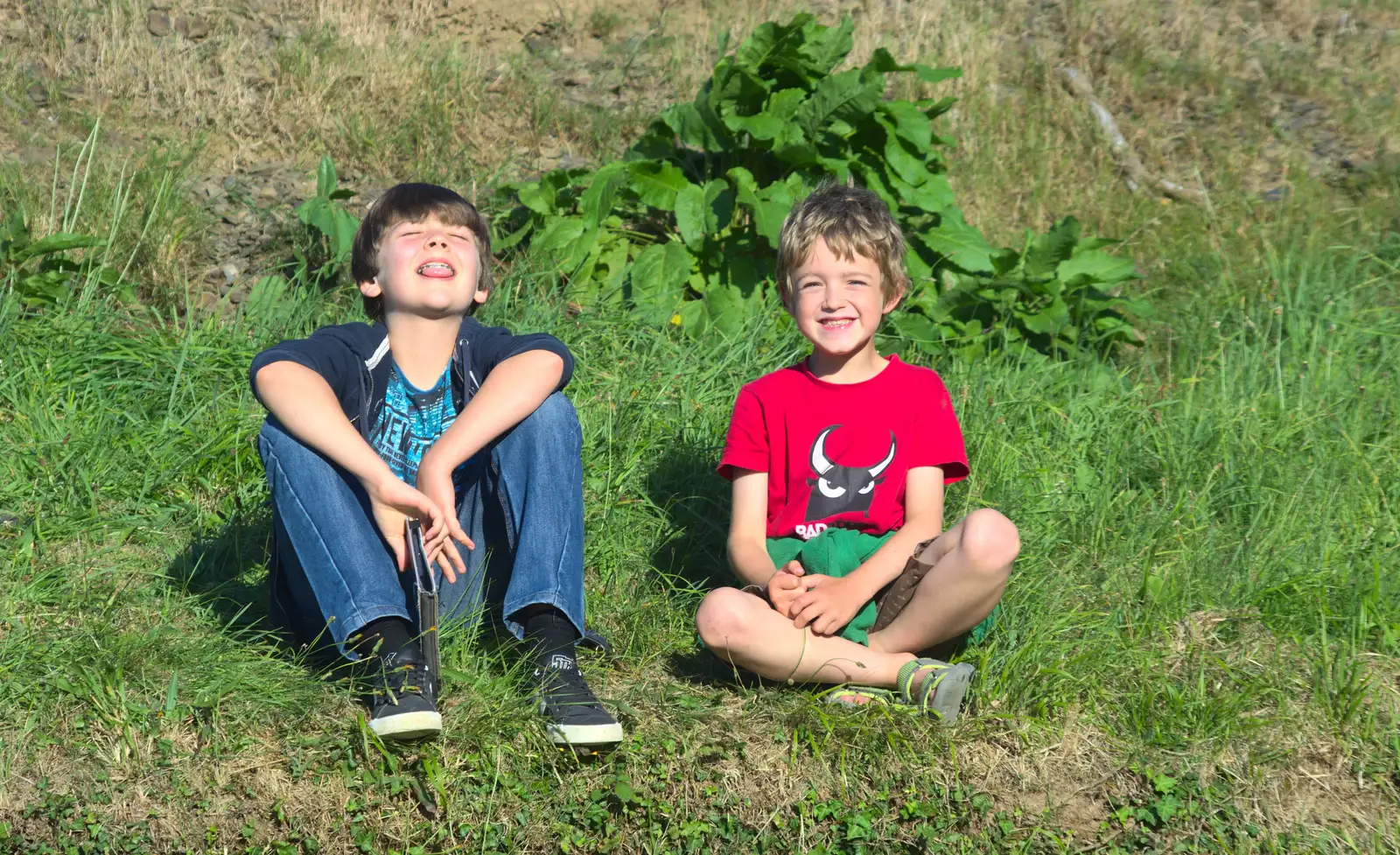 Rowan and Fred sit on a hill, from Camping With Sean, Ashburton, Devon - 8th August 2016