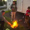 Sean pokes the fire, Camping With Sean, Ashburton, Devon - 8th August 2016