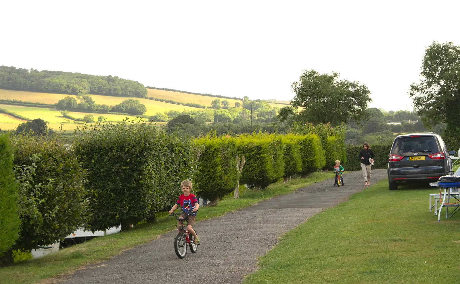 Fred comes back from somewhere on his bike, from Camping With Sean, Ashburton, Devon - 8th August 2016