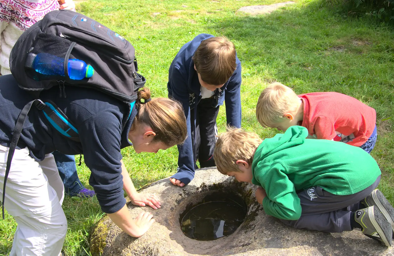 Everyone peers into a puddle of water, from Camping With Sean, Ashburton, Devon - 8th August 2016