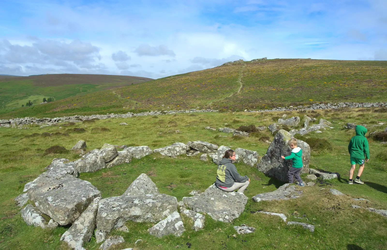 Isobel sits down on a rock, from Badger's Holt and Bronze-Age Grimspound, Dartmoor, Devon - 10th August 2016