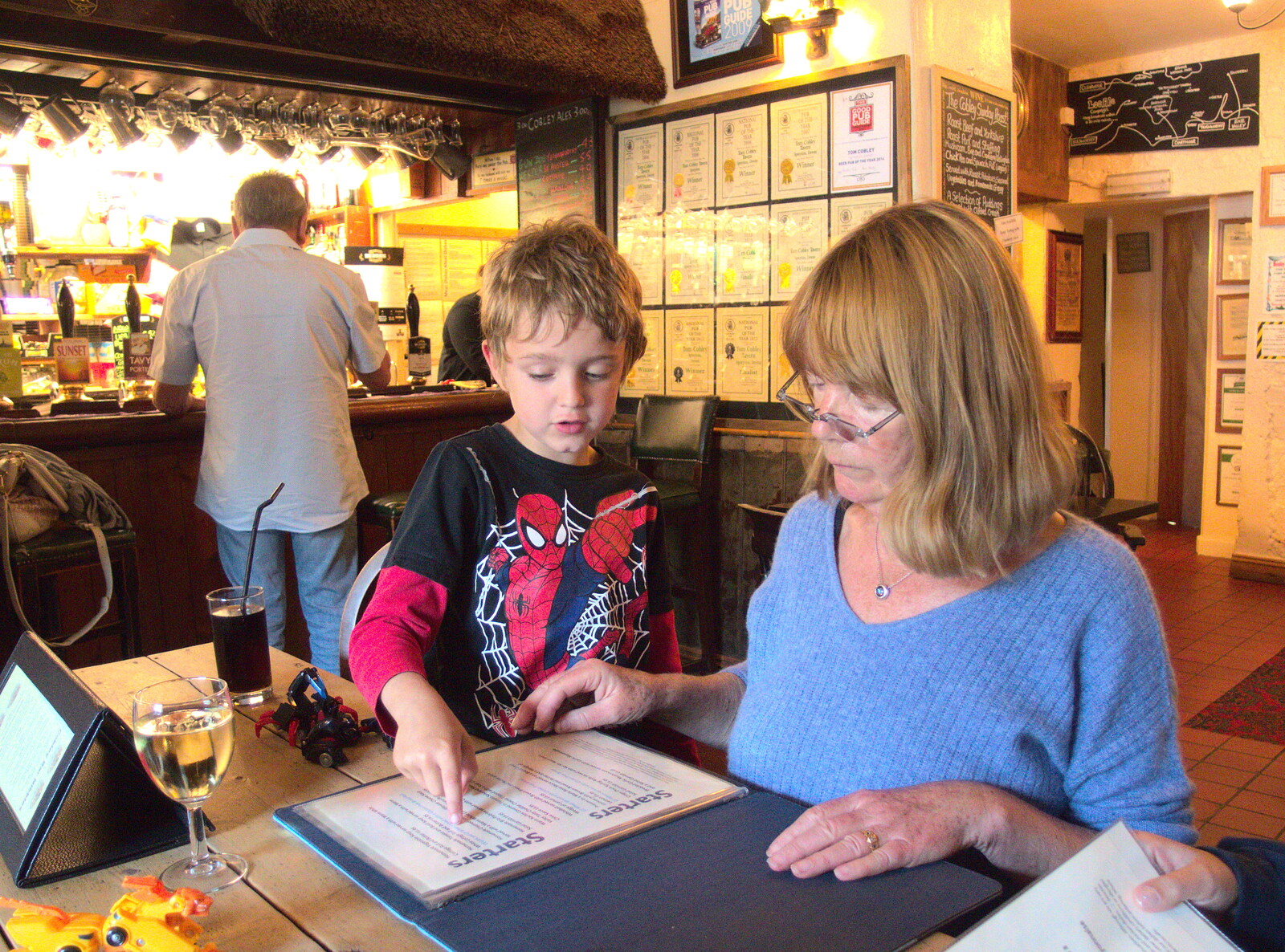 Fred helps Grandma J with the menu from The Tom Cobley and Castle Drogo, Spreyton and Drewsteignton, Devon - 11th August 2016