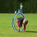 Fred hurls himself through moving hula-hoops, The Tom Cobley and Castle Drogo, Spreyton and Drewsteignton, Devon - 11th August 2016