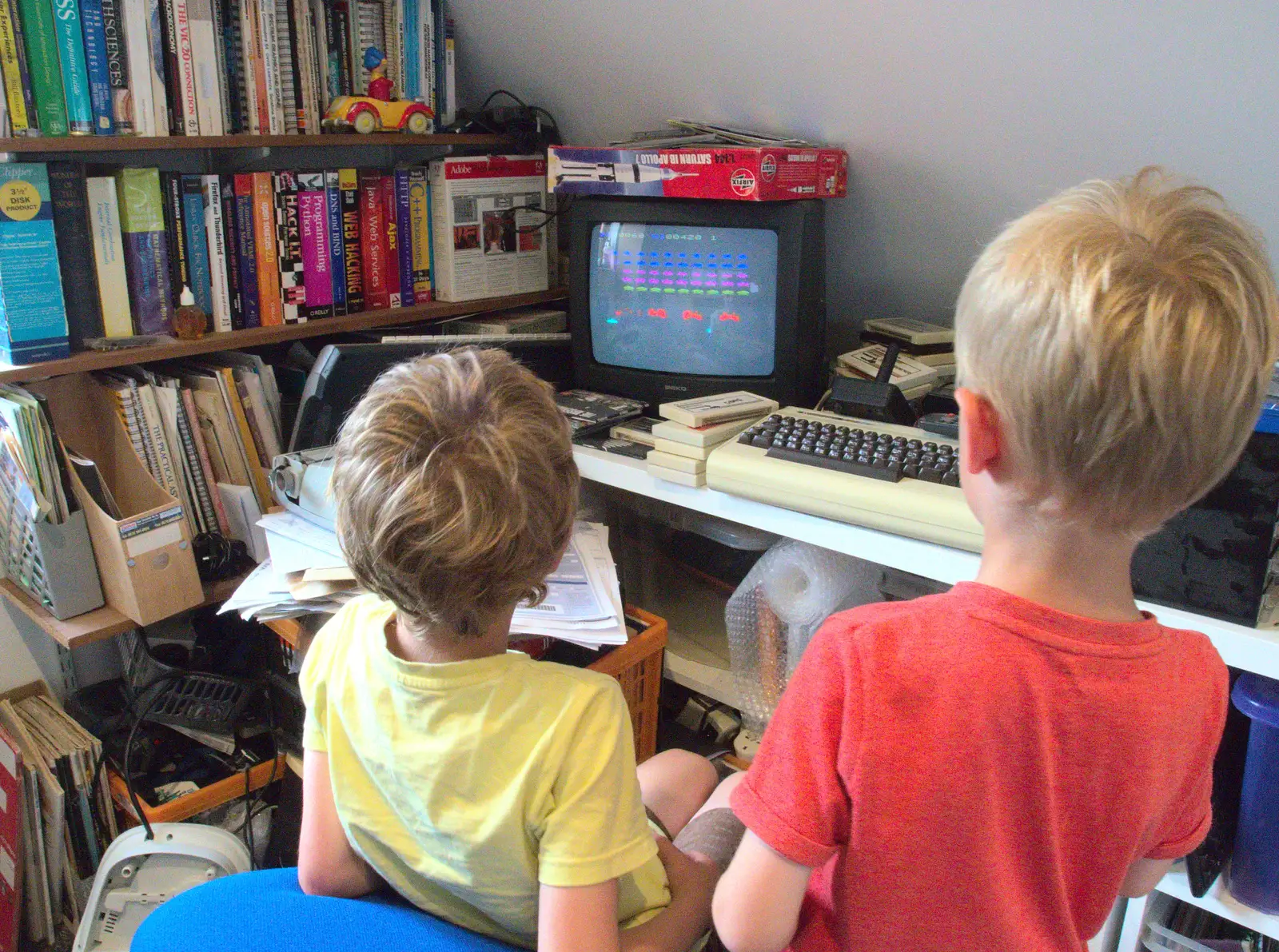 Fred and Harry do space invaders, from A Trip to the New Office, Paddington, London - 18th August 2016