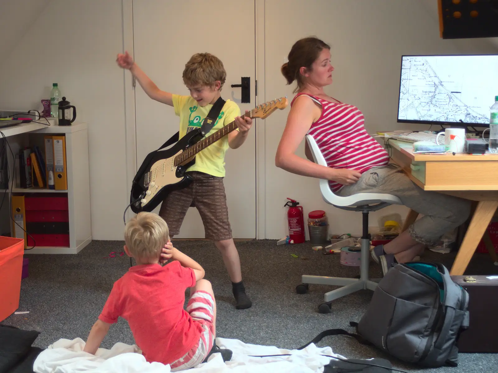 Harry thinks it's too loud as Fred plays guitar, from A Trip to the New Office, Paddington, London - 18th August 2016